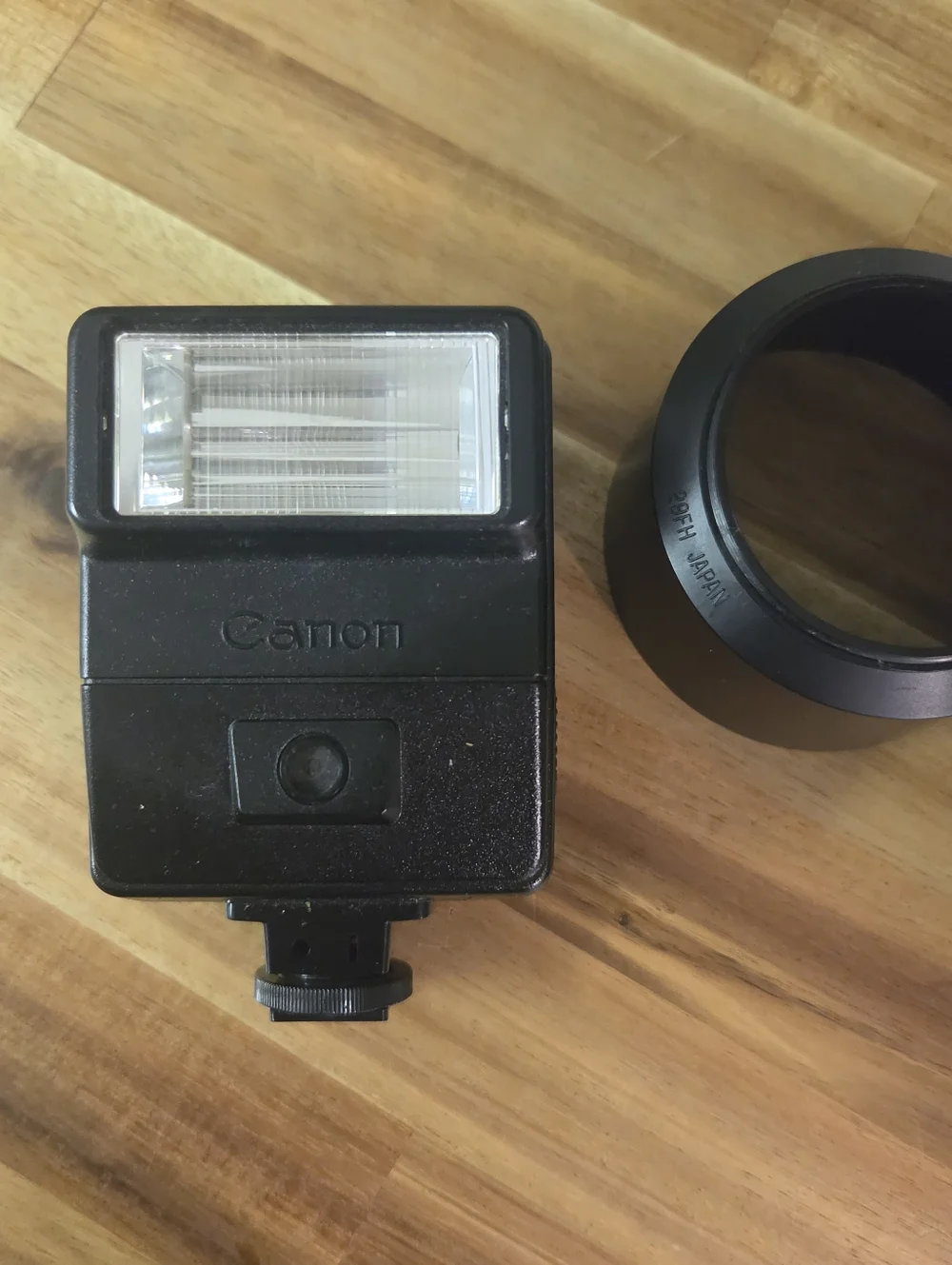 Canon Silver SLR Camera with Black Tamron 80-210mm Lens